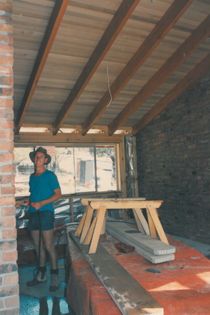 Kevin Hattin standing in a construction site when he was in his 20's